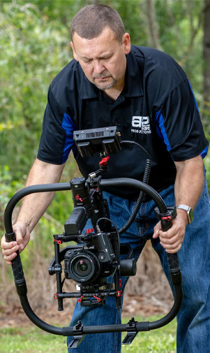 man holding photography camera