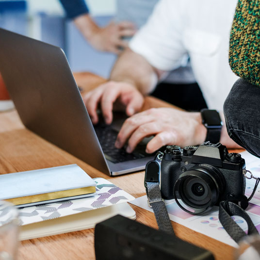 photographer using laptop